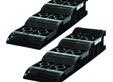 Two jumbo black plastic wheel levelling chocks